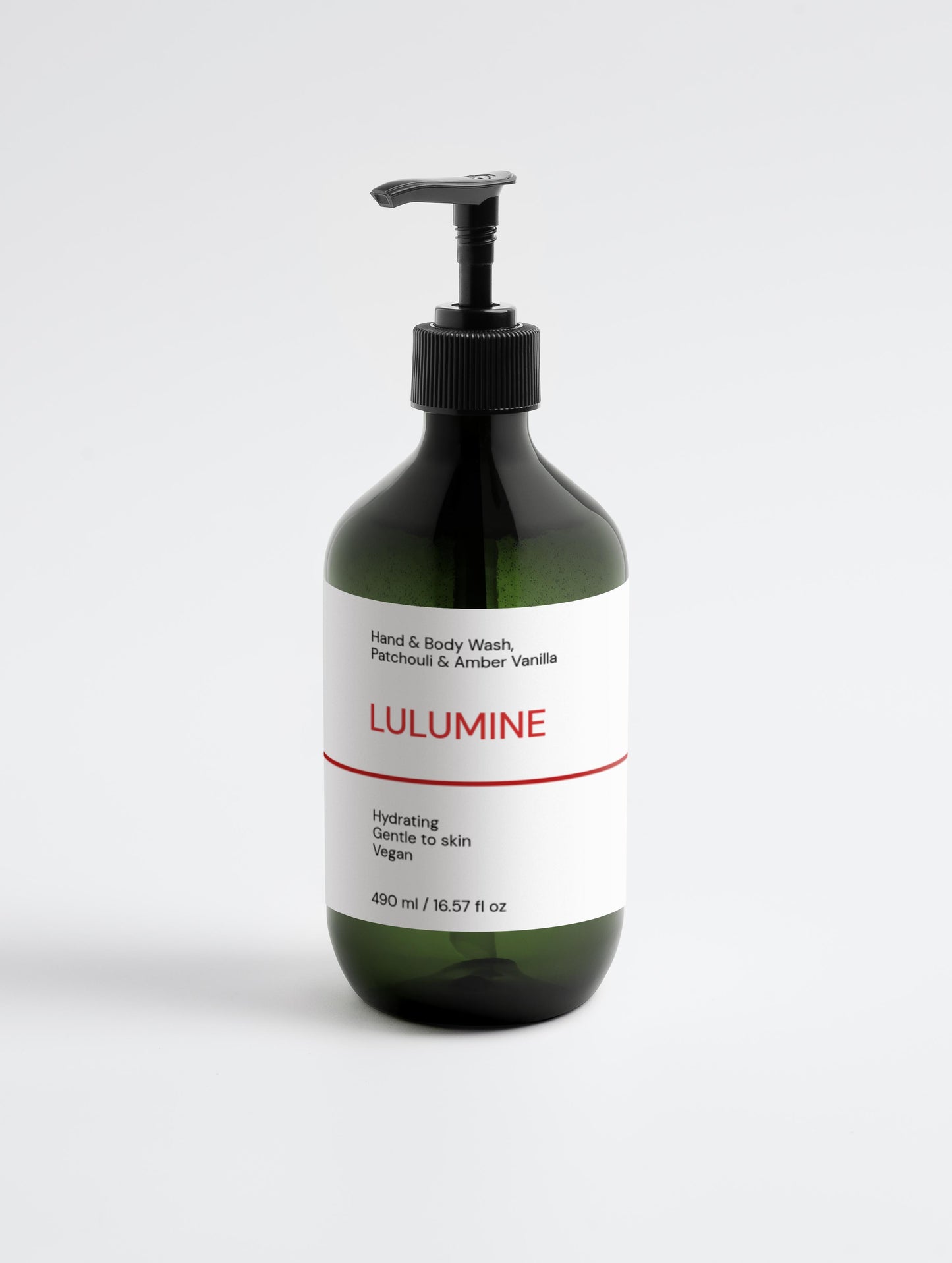 Green bottle of Lulumine hand and body wash on a white background