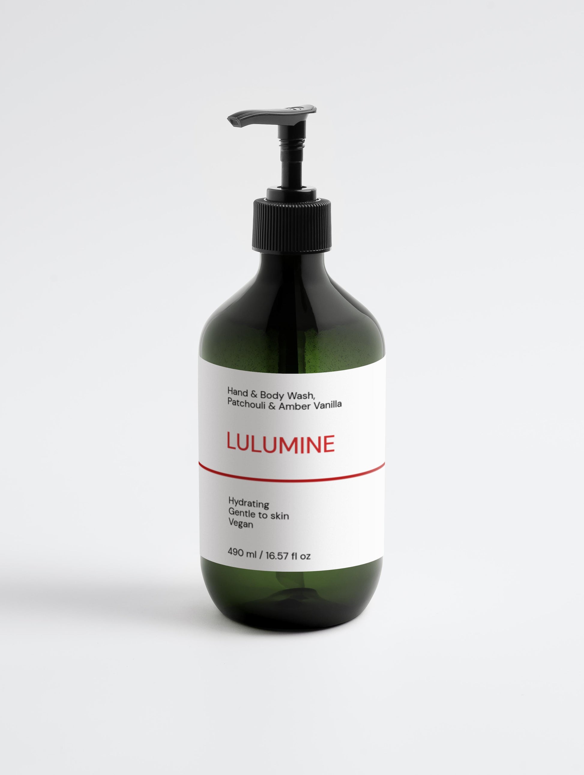 Green bottle of Lulumine hand and body wash on a white background